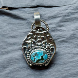 Turquoise small sterling silver pendant.    $65