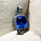 Blue Topaz 18 carat Sterling Silver Pendant.   $125
