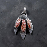 Fossilized Red Dinosaur Bone footprint Sterling Silver Pendant.   $125