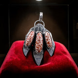 Fossilized Red Dinosaur Bone footprint Sterling Silver Pendant.   $125