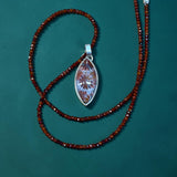 Fossilized Coral Pendant and Garnet necklace set.     $80