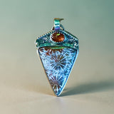 Fossilized Coral and Garnet sterling silver pendant.    $75