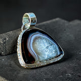 Agate slice sterling silver pendant $60