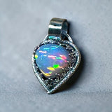 Ethiopian Opal 6 Carat Sterling Silver Pendant.   $150