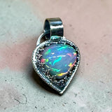 Ethiopian Opal 6 Carat Sterling Silver Pendant.   $150