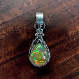 Ethiopian Opal 9 Carat Sterling Silver Pendant.     $250