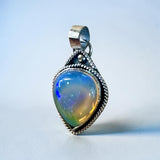 Ethiopian Opal 14 Carat Sterling Silver Pendant.     $250
