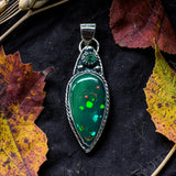 Ethiopian Black/Green 6.5 Carat and Emerald Sterling Silver Pendant     $200