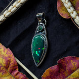 Ethiopian Black/Green 6.5 Carat and Emerald Sterling Silver Pendant     $200