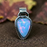 Ethiopian Opal 8 Carat Sterling Silver Pendant.     $200