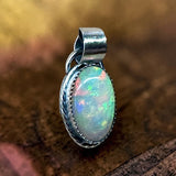 Ethiopian Opal 6 Carat Sterling Silver Pendant.    $150