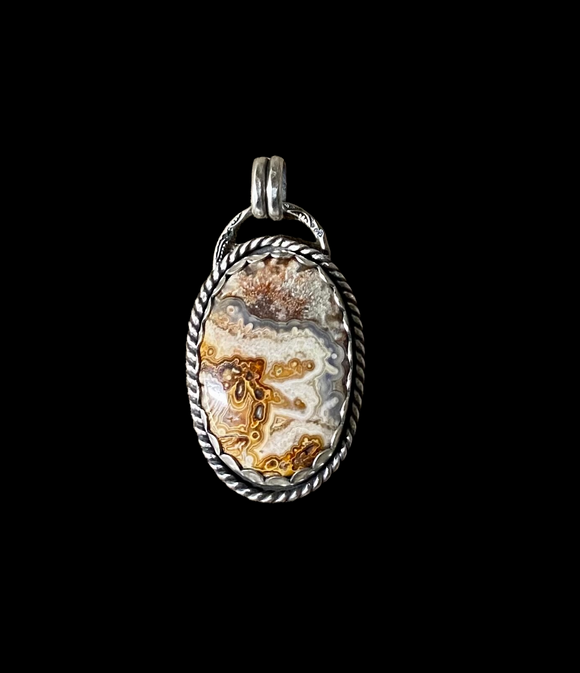 Crazy Lace Agate sterling silver pendant.    $65