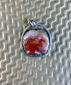 Crazy Lace Agate sterling silver pendant.  $60