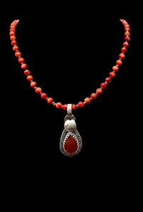 Carnelian sterling silver pendant and coral necklace set.       $65