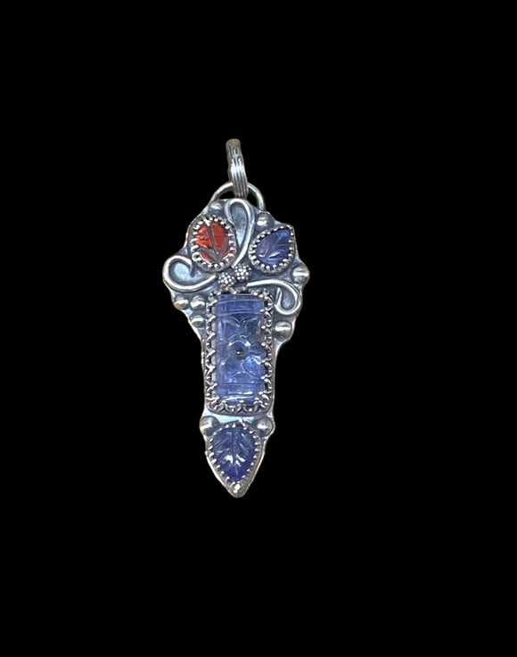 Carved Tanzanite and Carved Garnet sterling silver pendant     $70