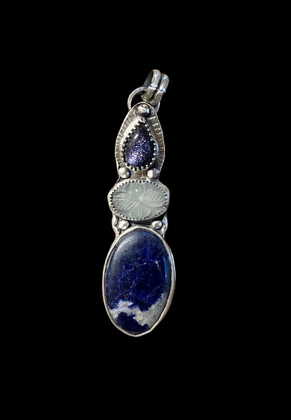 Sodalite , carved moonstone and Blue Goldstone sterling silver pendant.      $50