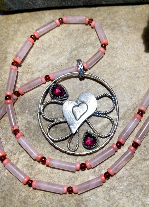 Garnet and Heart sterling silver pendant and necklace.  $75