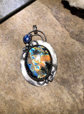 Multi color labradorite and Kyanite sterling silver pendant.    $70