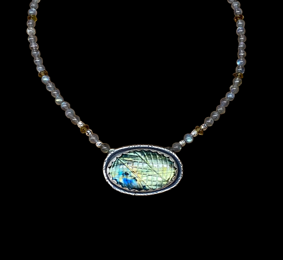 Carved labradorite sterling silver pendant and matching necklace set.     $75