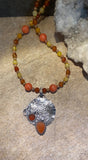 Carnelian sterling silver pendant and multi gemstone necklace.  $60