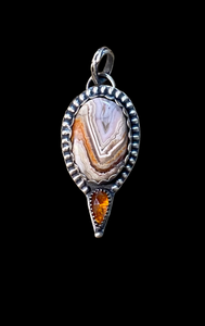 Crazy Lace Agate and Orange Kyanite sterling silver pendant.     $55