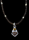 Carved smoky Quartz and Montana Agate sterling silver pendant and matching necklace set.     $65