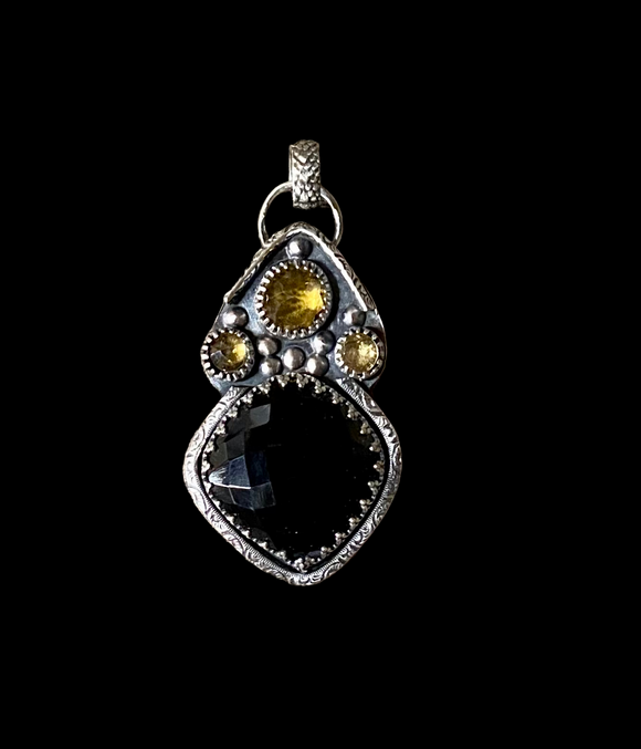 Onyx and citrine sterling silver pendant.      $75
