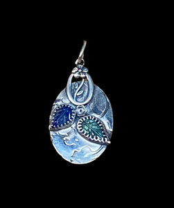 Tanzanite and Emerald carved Leaves sterling silver pendant.    $50